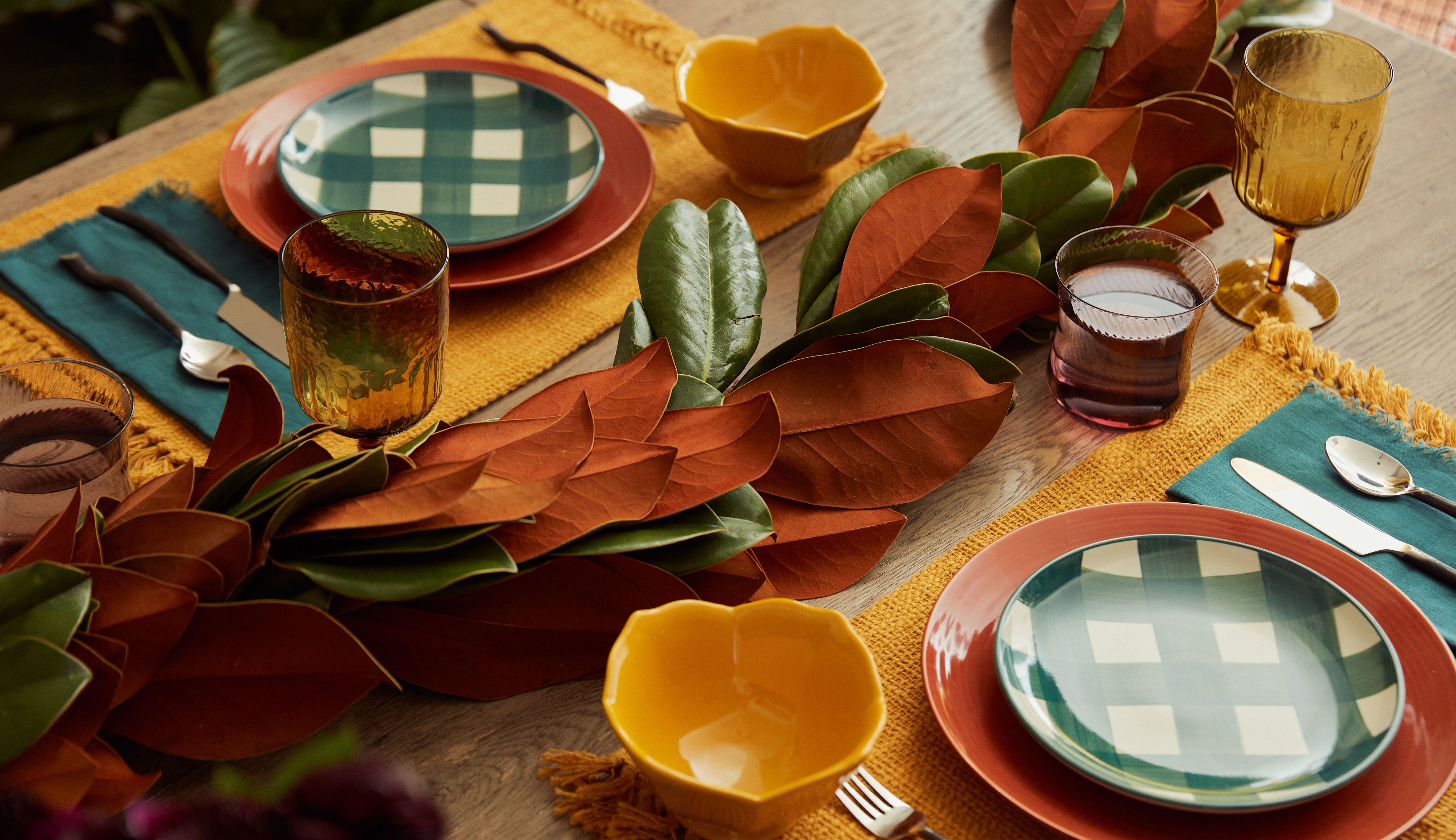 Close up of fall magnolia garland for fall tablescape trends for 22