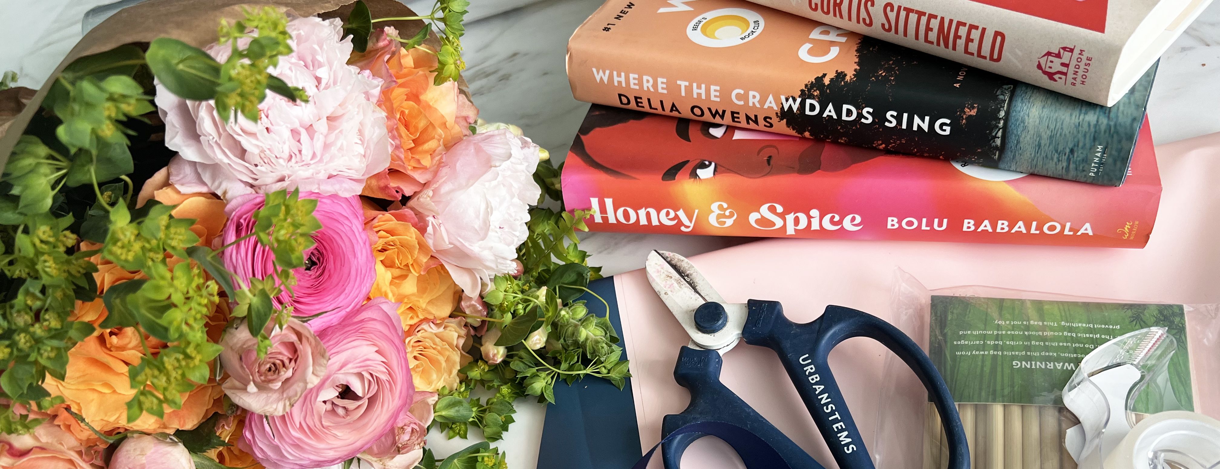 A flower bouquet and stack of books for a diy project