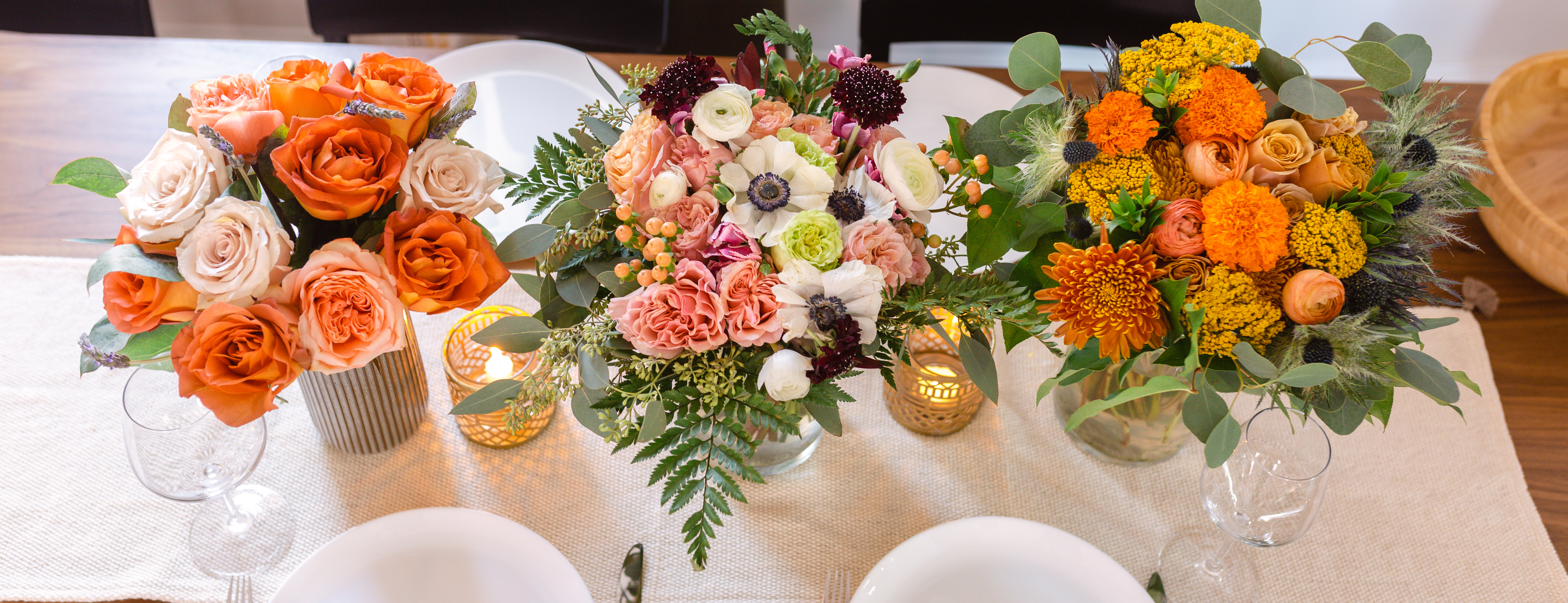 Tablescape with three summer bouquets.