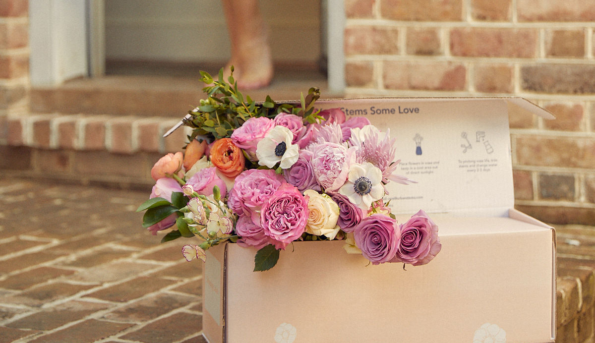 Bouquet of flowers for delivery in light pink UrbanStems box.