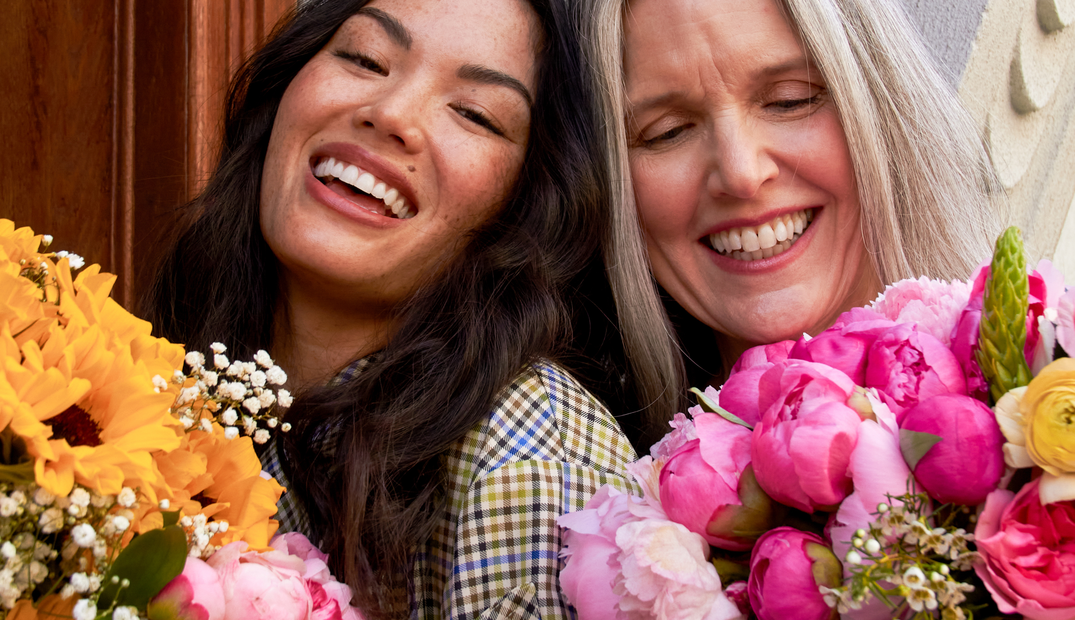 Woman and her Mom enjoying Mother's Day flowers 