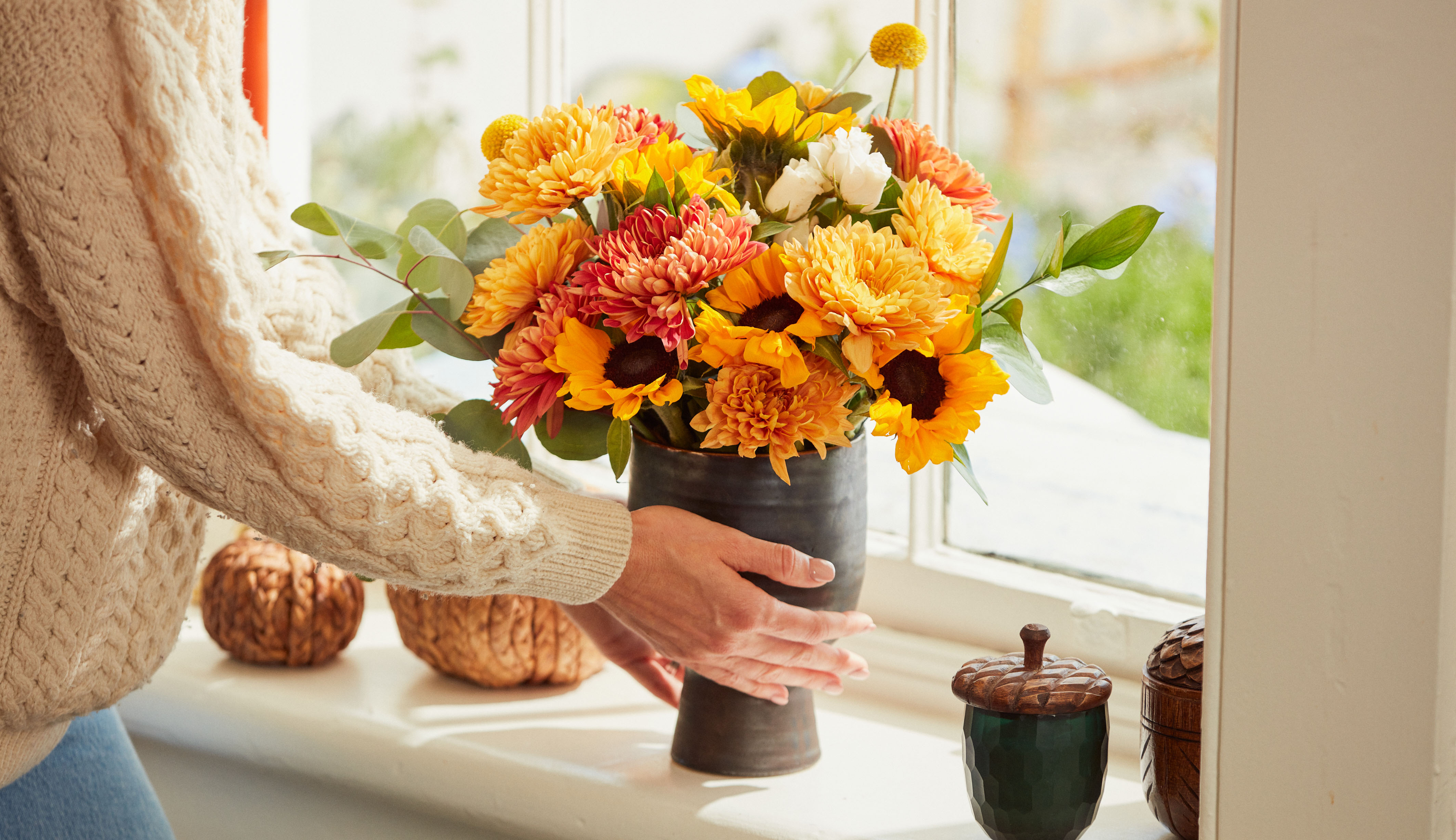 Close up of a fall bouquet containing mums