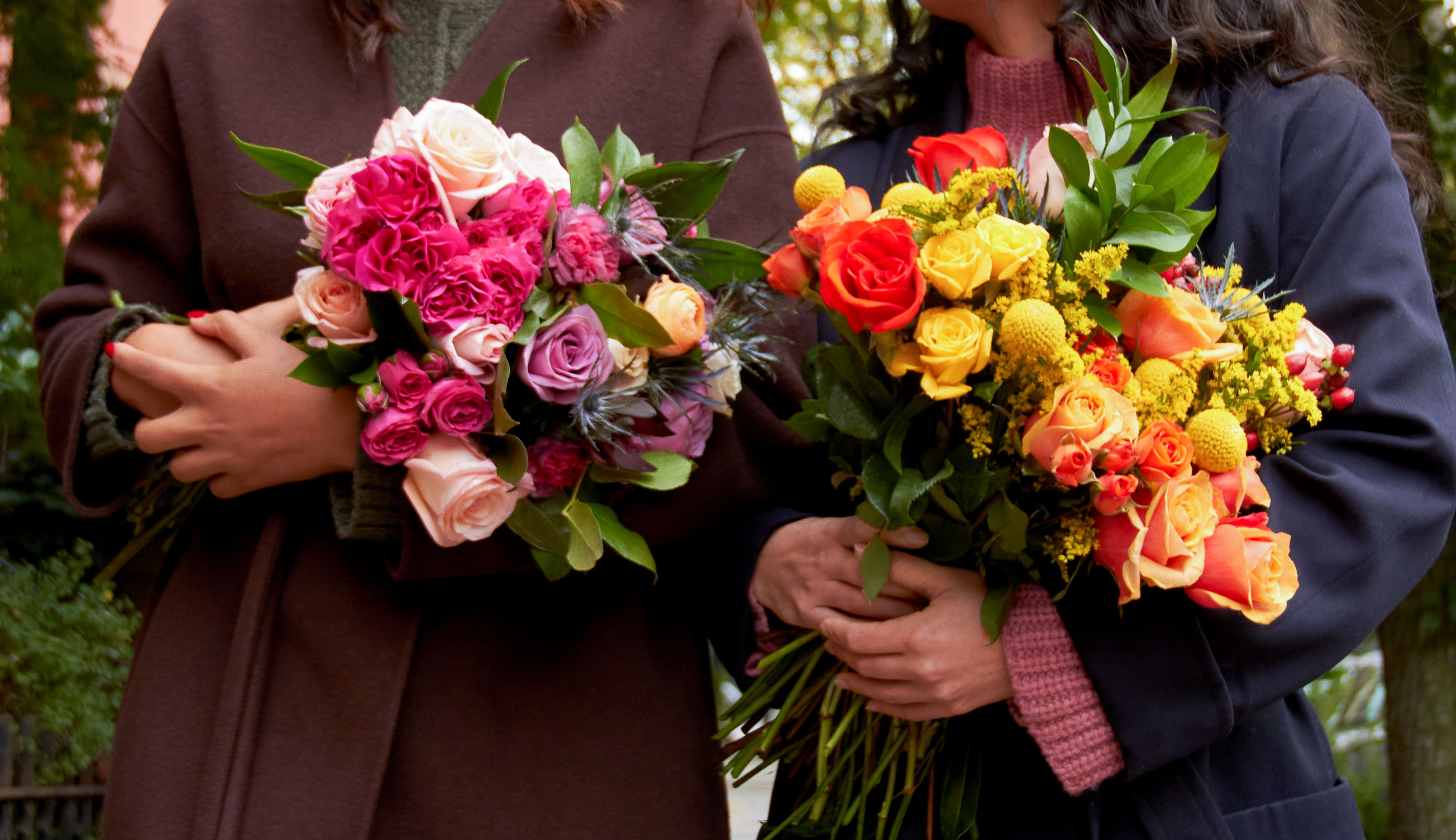 Women celebrating International Women's Day 2023 with bouquets of flowers
