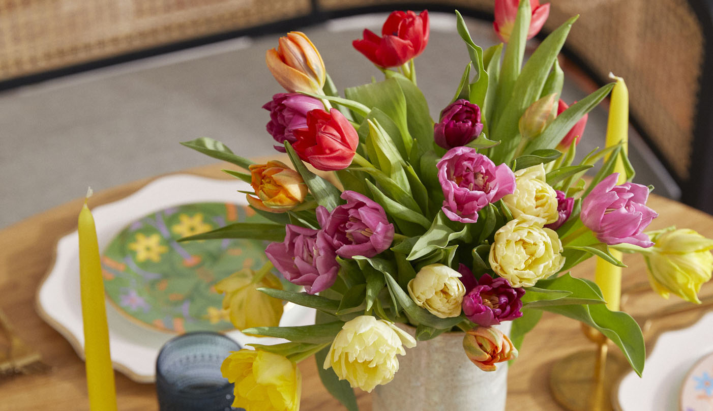 A bouquet of springtime tulips in red, orange, and yellow
